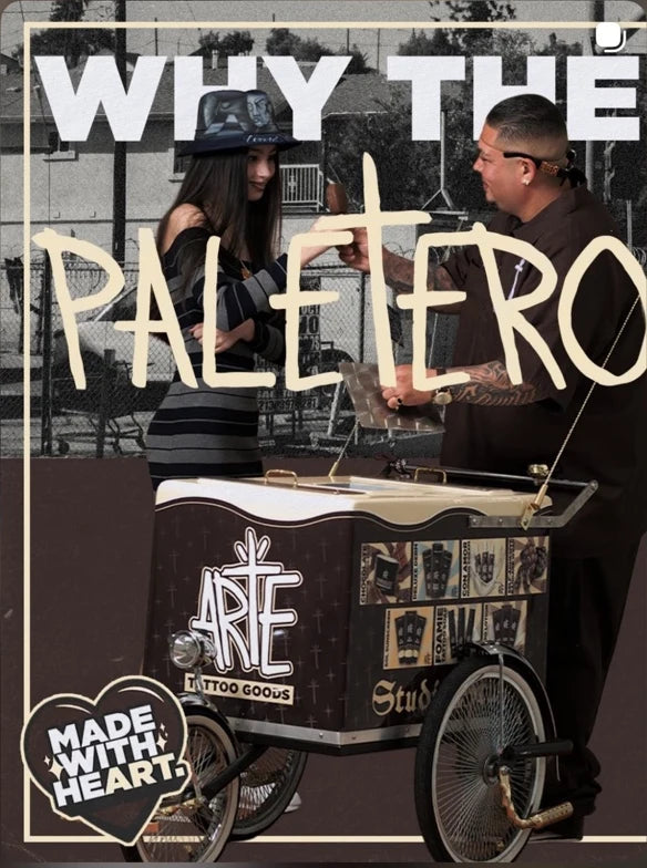 Two people beside Arte’s paletero bicycle cart